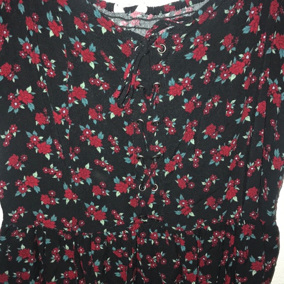 Black over the shoulder dress with red flowers. - Picture 3 of 3
